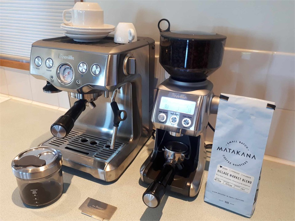 Espresso coffee machine with grinder.