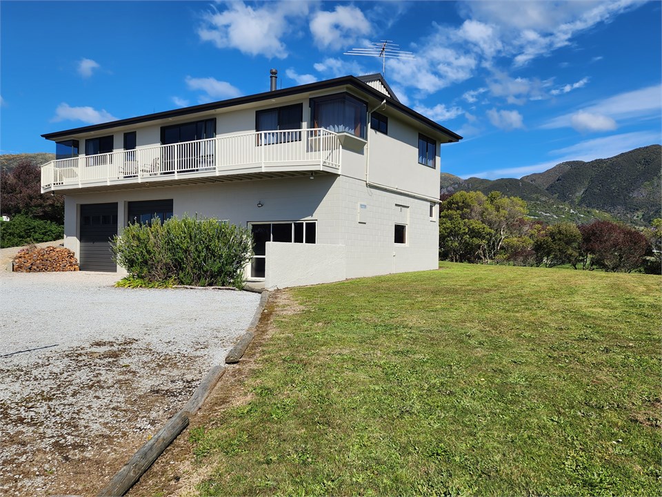 large lawn and parking space