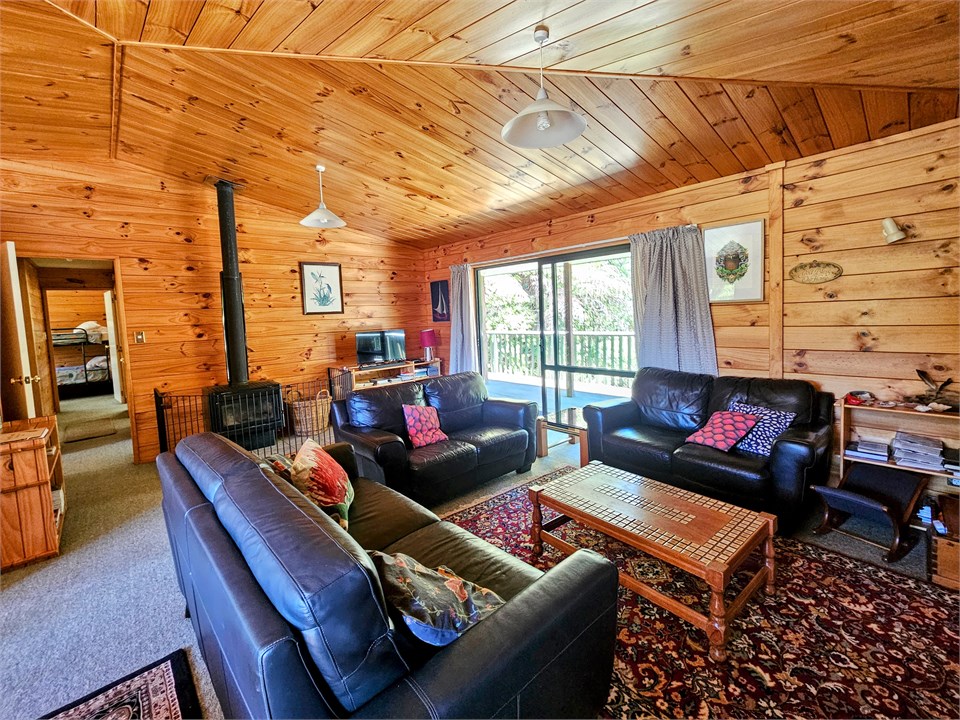 House, lounge opening to large deck