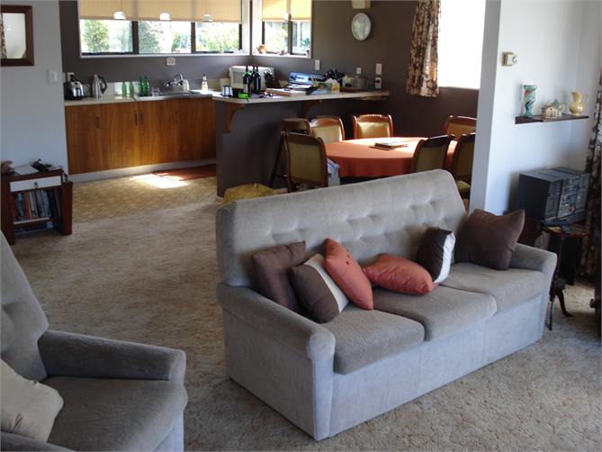 View from lounge through to dining and kitchen are