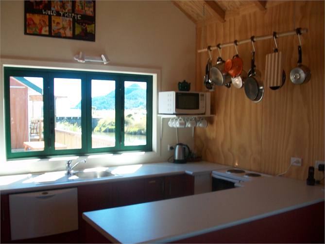 Concertina windows in kitchen to deck.