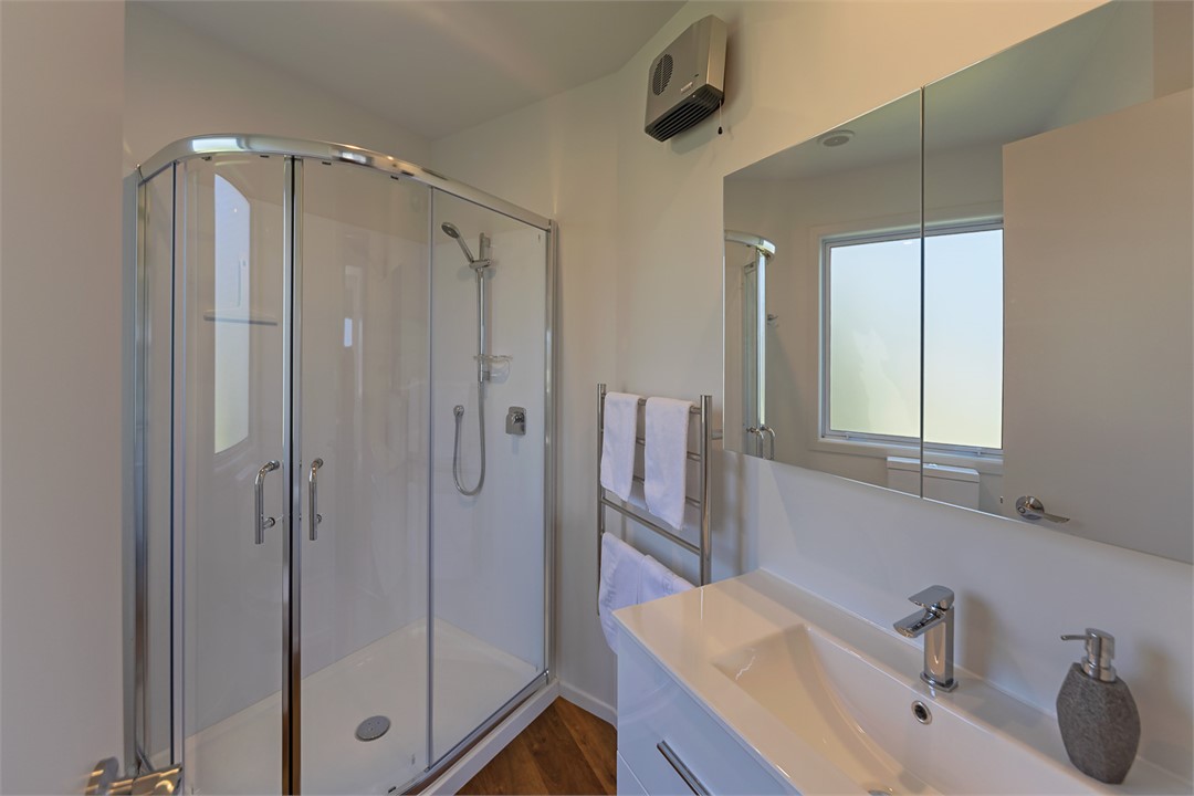 Bathroom 2 with shower, toilet & vanity