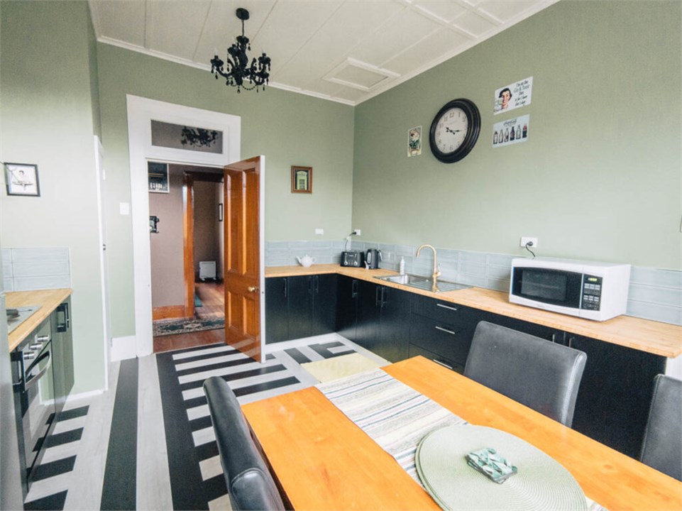 East Wing kitchen-dining-laundry