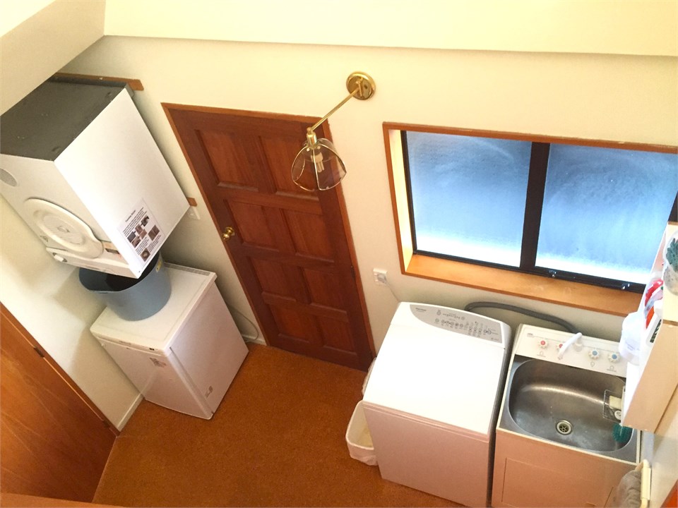 Laundry with tumble drier, washing machine & extra