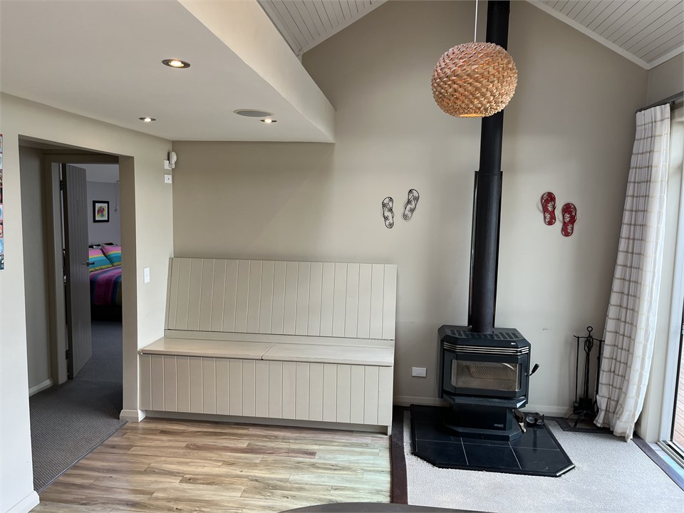 Woodburner and woodbox seat