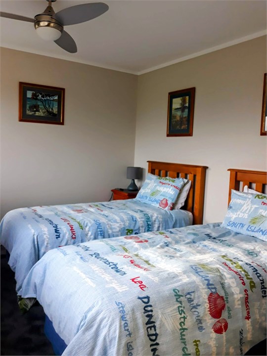 Single Beds Bedroom with ceiling fan