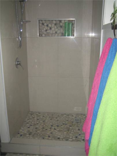 Walk in tiled shower