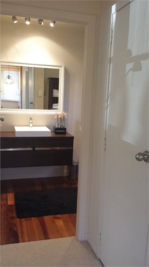 Upstairs bathroom vanity and mirror