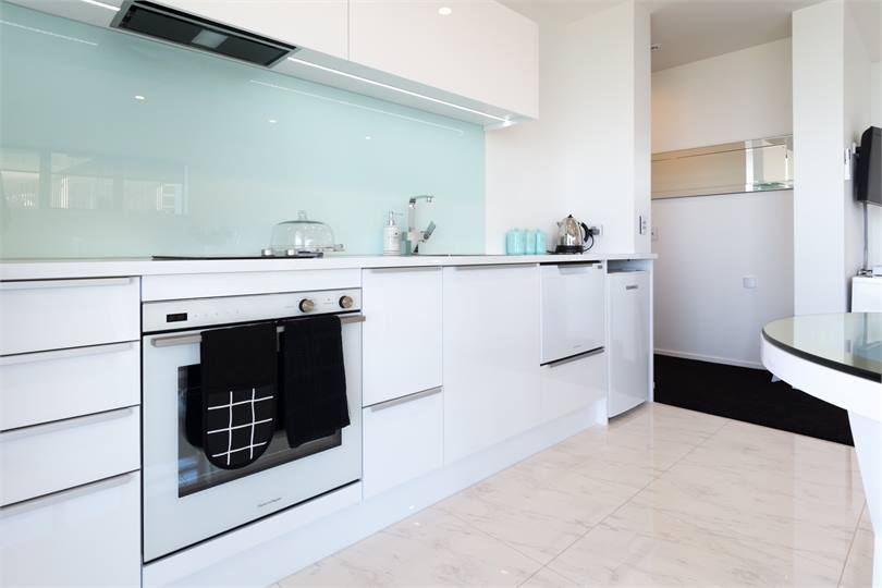 Fully equipped kitchen now with dual-washer/dryer 