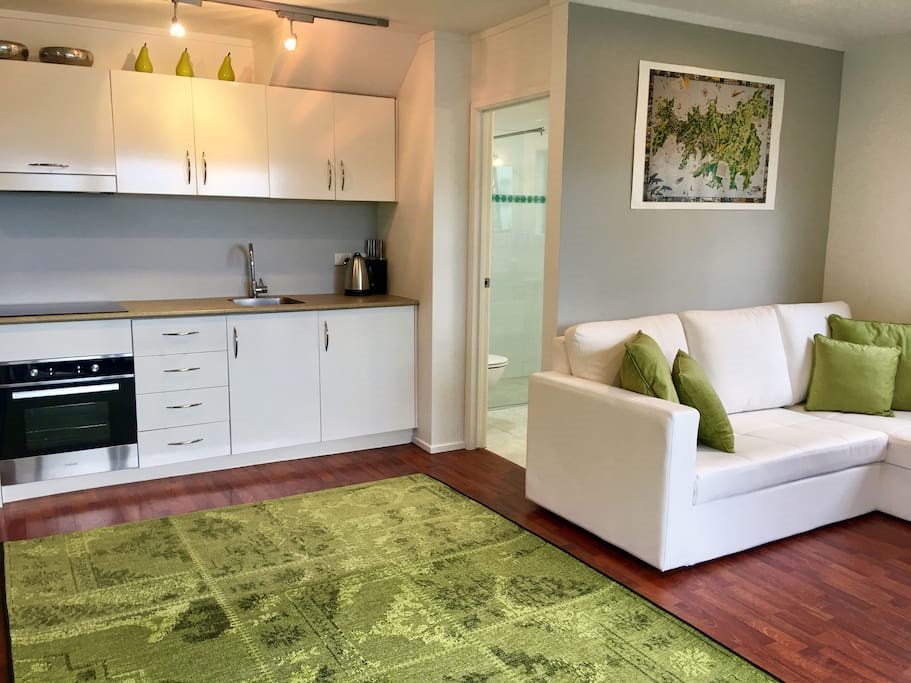 LOUNGE THROUGH TO BATHROOM AT THE BACK