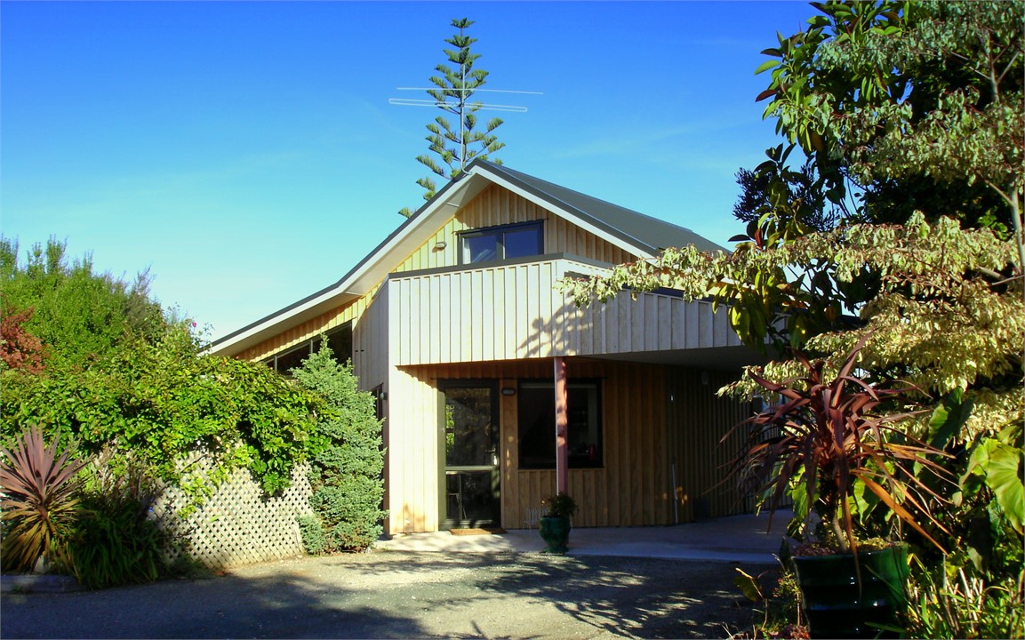 House offers a carport for off road parking