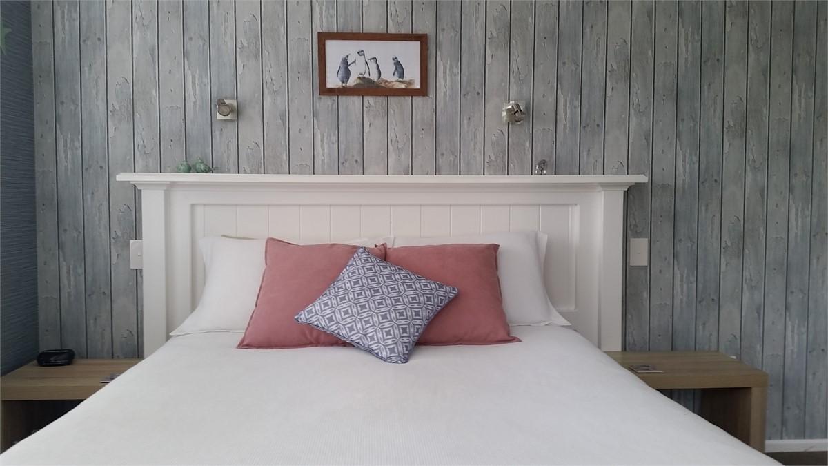 Front Bedroom - Queen bed. Sunny and light