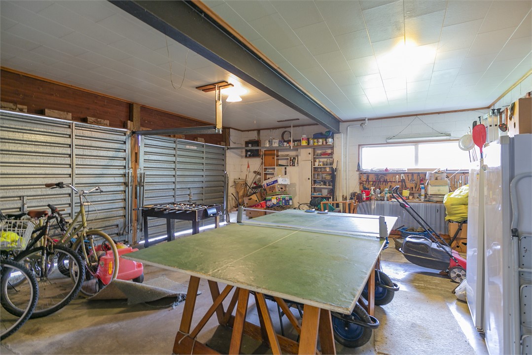 The garage holds table tennis, bikes and sports eq