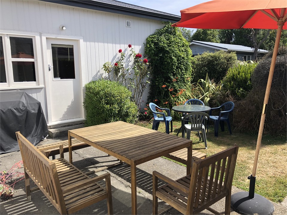 Sunny BBQ area outside lounge