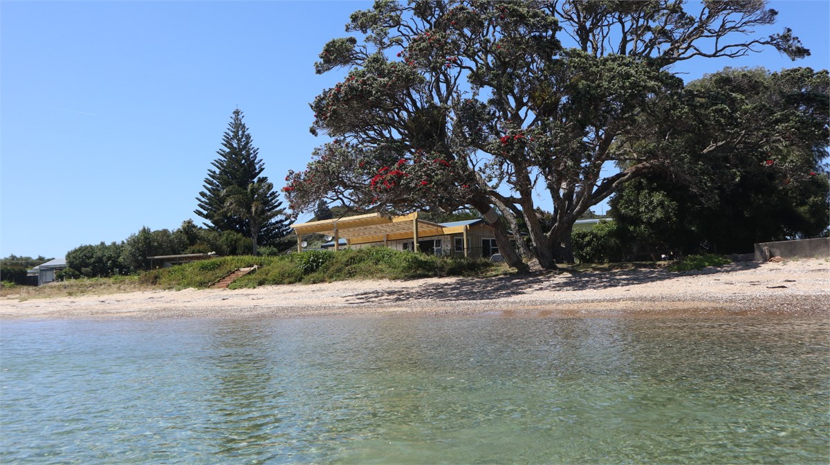 View back to cabin and house from estuary