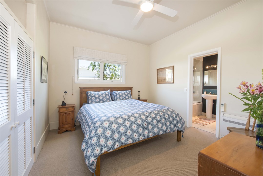 Master bedroom with King bed & ensuite bathroom