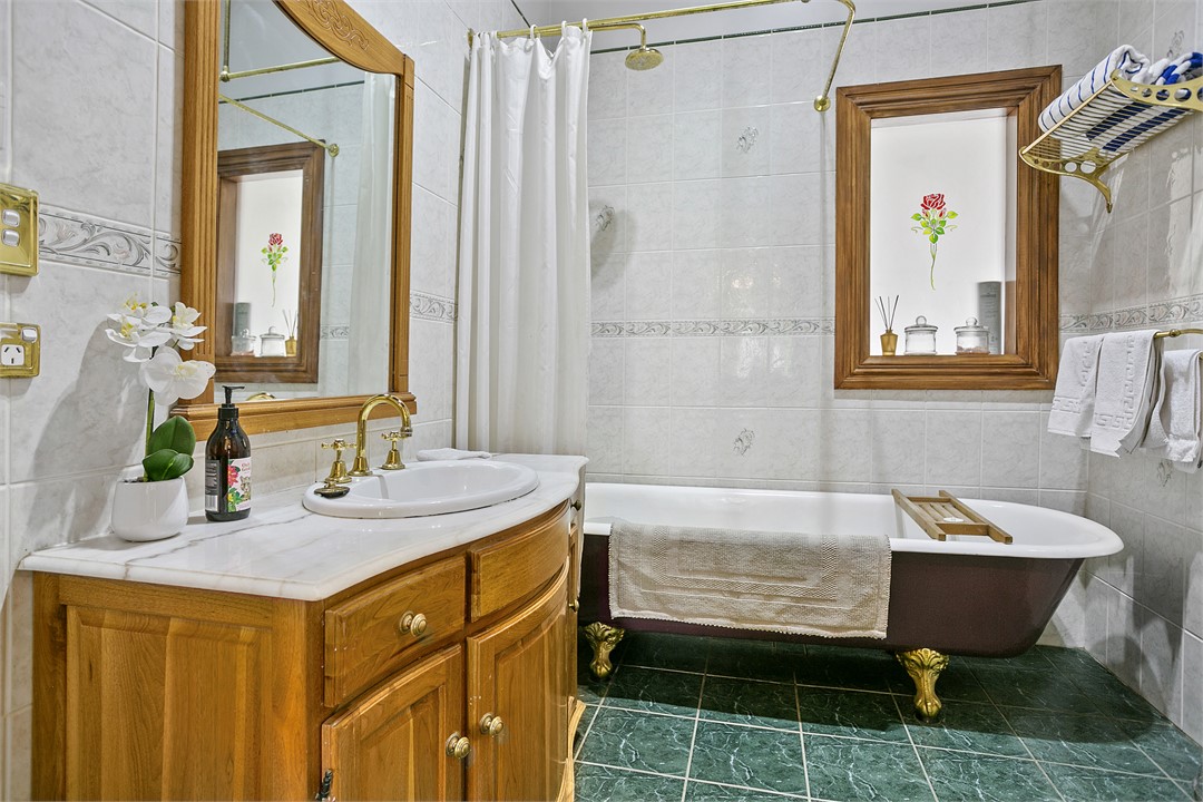 Bathroom 1  Shower over Bath & toilet