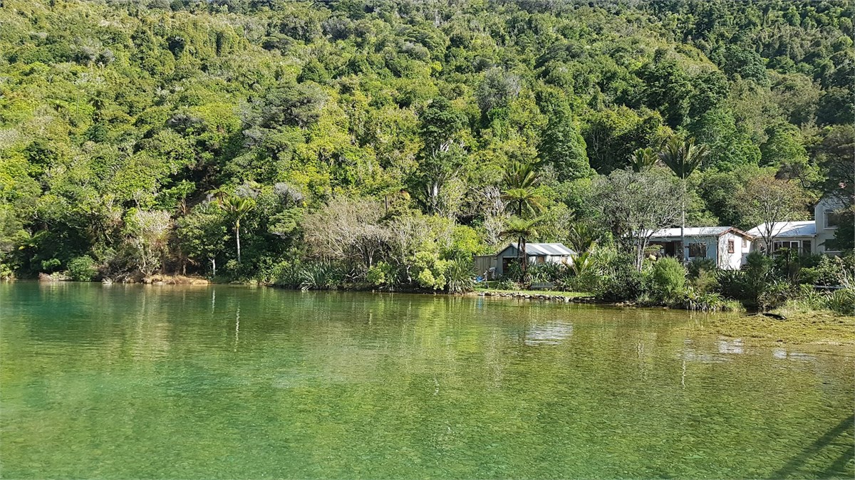 cottage with house behind