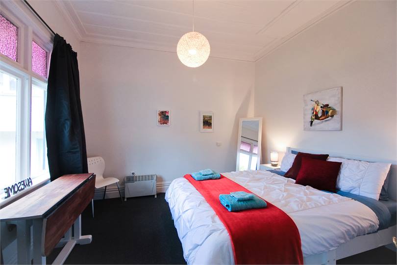 First bedroom has a queen bed