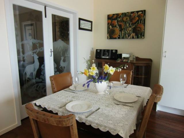 Dining room with Doors going through to lounge Roo