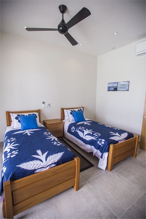 Bedroom 2 w two x long single beds