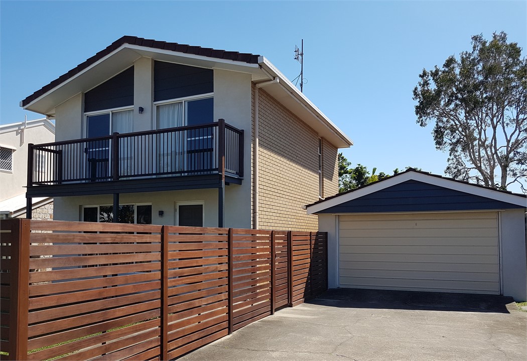Front of Home and Remote single garage.