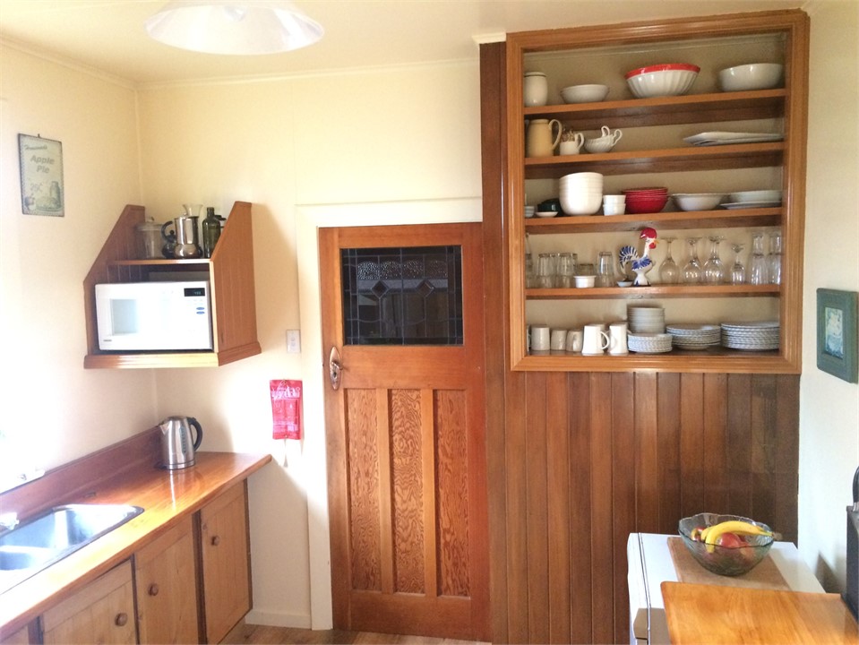 Country style kitchen including dishwasher and mic