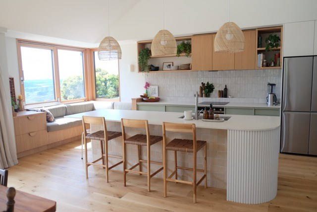 Large kitchen with the cosy kitchen island window 