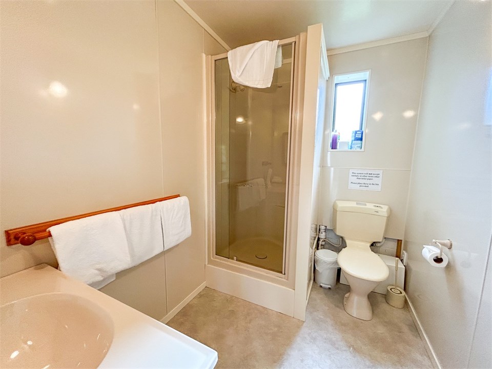 Downstairs bathroom with shower & toilet