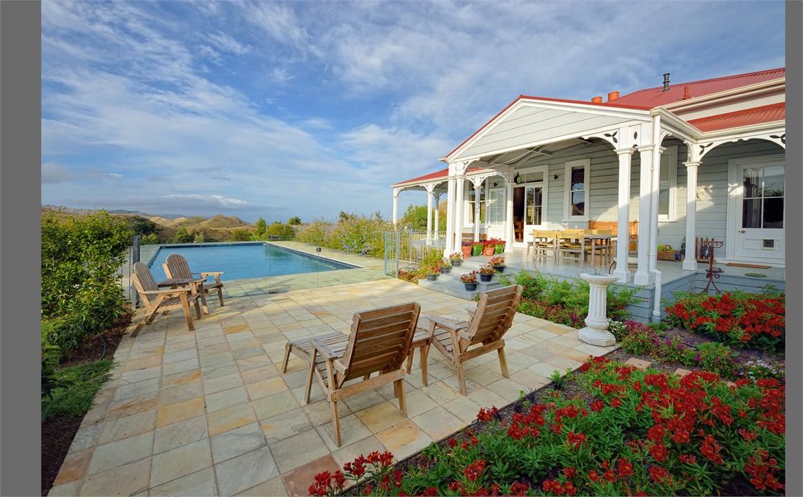 Cottage setting by the shared pool