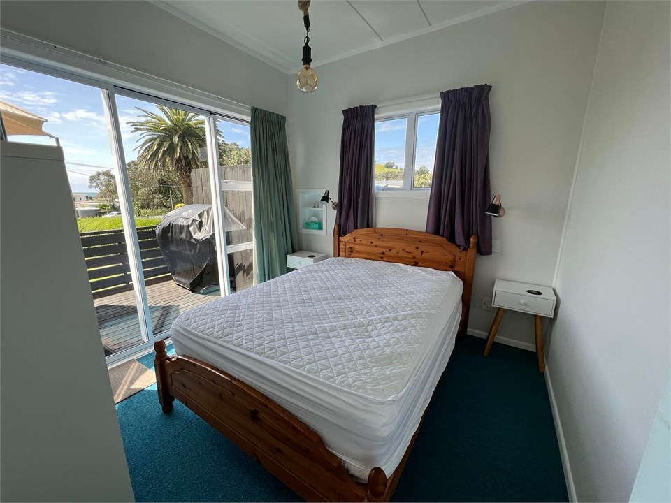 Main double bedroom with direct access onto front