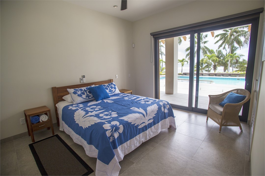 Bedroom 3 w King Bed and pool and ocean views