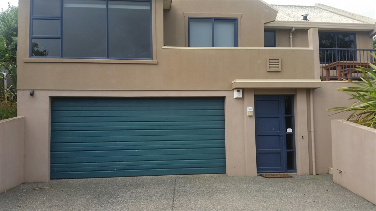 house entrance from roadside.Double garage, guest