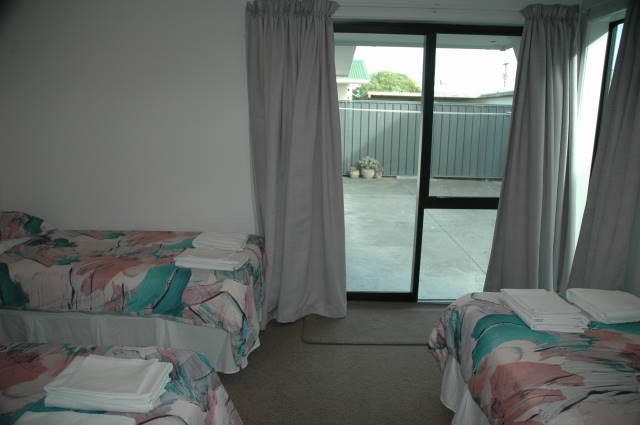 Fourth bedroom with 3 single beds