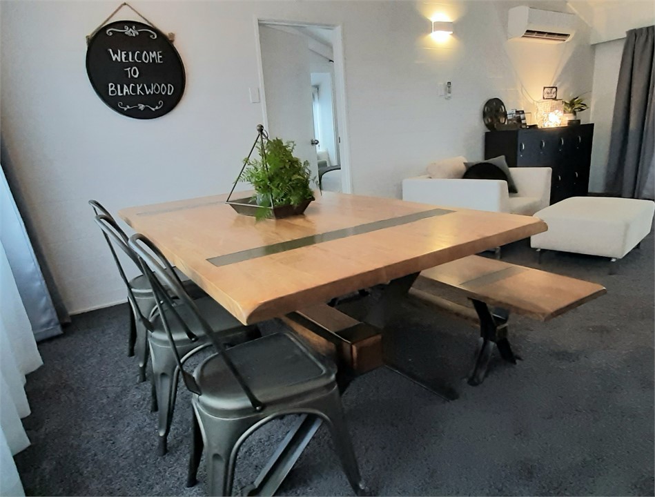 Enjoy a meal or game of cards around the large din