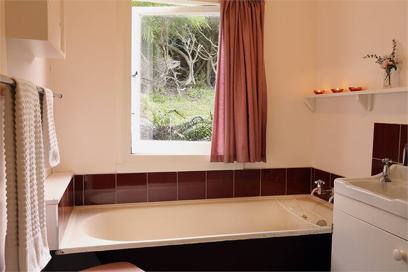 Bathroom with bath and shower