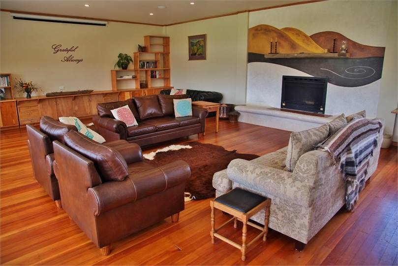 Open plan Lounge and Living with fireplace.