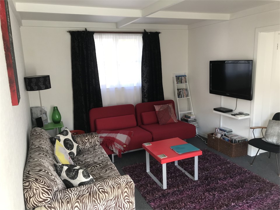 Comfy lounge area with TV and DVDs