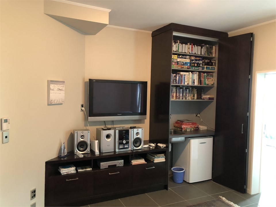 Downstairs has a 2nd family room for kids movies a