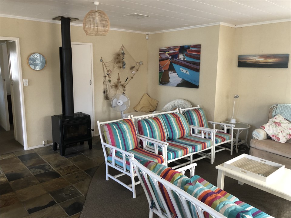 Lounge has a wood burner fire