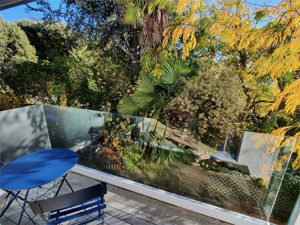 The balcony with outdoor dining area