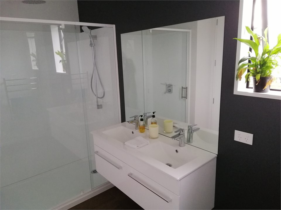 En suite shower with one of those bahama rain can 