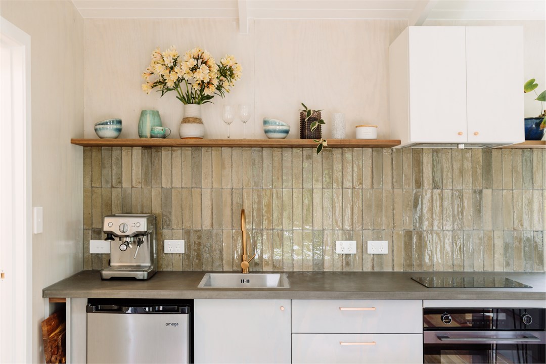 Open plan kitchen living area in cottage