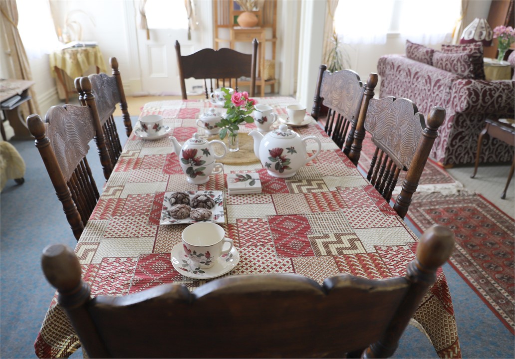 Ko te Ruma Kai. Dining Room with small fridge, ju