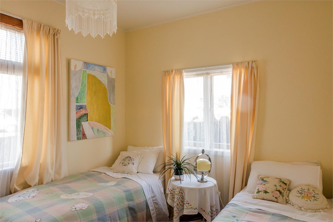 Bedroom 2 with Single + Single beds