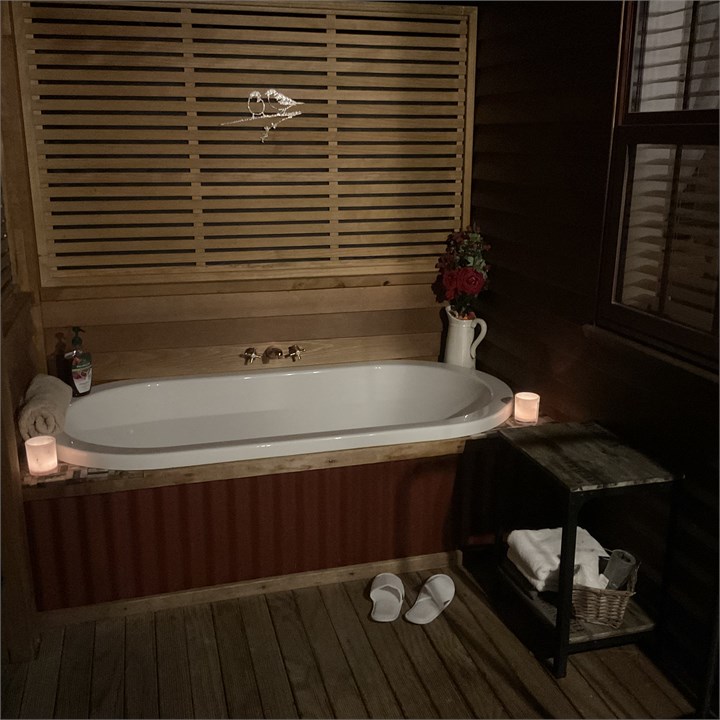 Outdoor bath under verandah for all year round bat