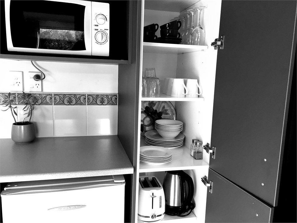 Guests have a Kettle, Toaster, Microwave, Fridge