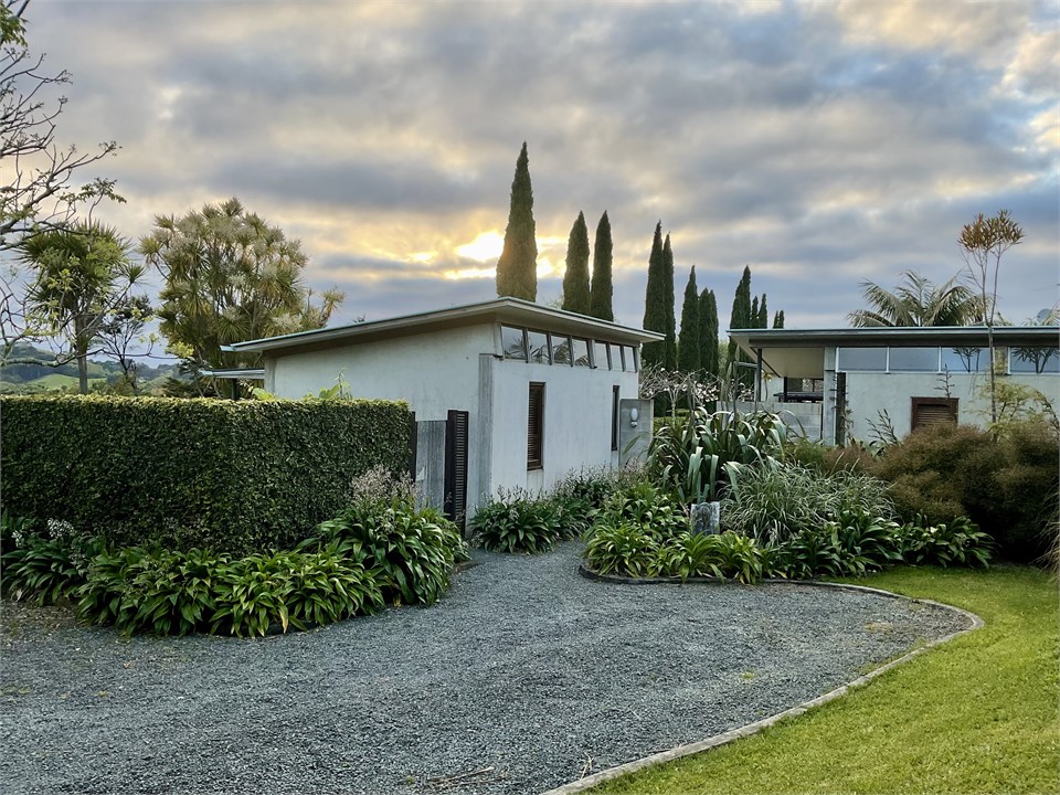 Front private  entrance on left and  parking