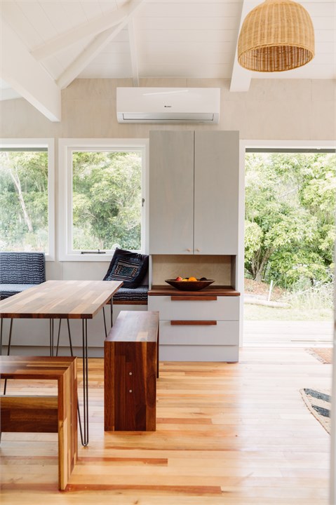 Open plan kitchen living area in cottage