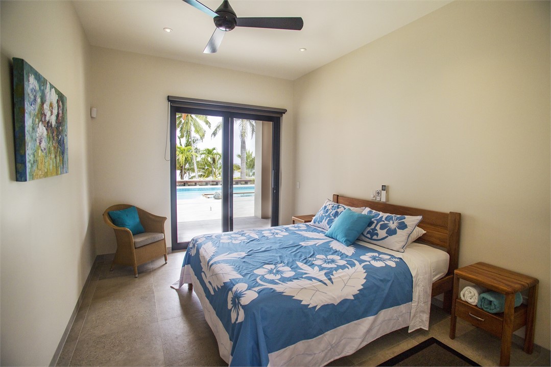 Bedroom 5 w King Bed and pool and ocean views